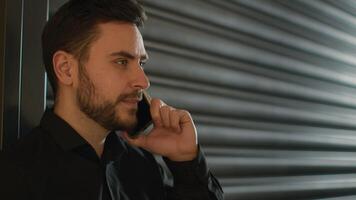 Caucasian businessman talk mobile phone indoors business entrepreneur salesman chatting with colleague remote conversation use smartphone man guy speaking cellphone talking smartphone calling remote photo