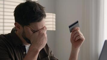 Anxious Caucasian businessman business client office employer upset man pay online on laptop rejected credit card limit problem with internet e-banking fail transaction error not enough money balance photo
