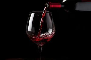 Pouring red wine to glass party restaurant bar gourmet celebration luxury taste splashing grape alcohol expensive drink bordeaux chateu cabernet bottle refreshment toned drops bubbles photo