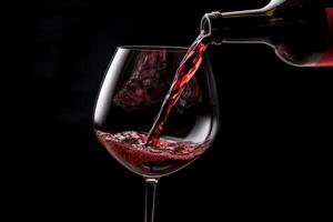 Pouring red wine to glass party restaurant bar gourmet celebration luxury taste splashing grape alcohol expensive drink bordeaux chateu cabernet bottle refreshment toned drops bubbles photo