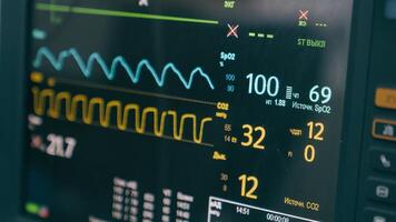 Medical equipment in hospital modern heart rate monitor in operating room display for monitoring patient vital signs anesthesia indicators on screen computer in professional healthcare clinic surgery photo