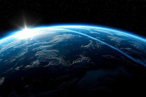 A view of the Earth from space, with a bright blue planet surrounded by a dark sky. The stars are scattered throughout the sky, creating a sense of vastness and wonder photo