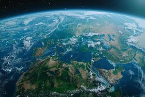 A view of the Earth from space, with a bright blue planet surrounded by a dark sky. The stars are scattered throughout the sky, creating a sense of vastness and wonder photo