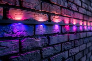 A brick wall with a pink hue and a blurry background. Neon lights. The wall appears to be wet and has a shiny, reflective surface. Scene is one of mystery and intrigue, as the blurry photo