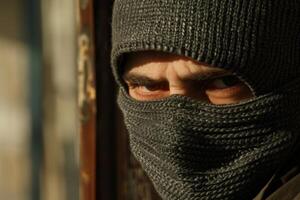 Burglar thief robbing house criminal activity robbery burglary mask crime scene stealing mugger security risk cctv camera catch illegal activity dangerous evil violence gun balaclava photo