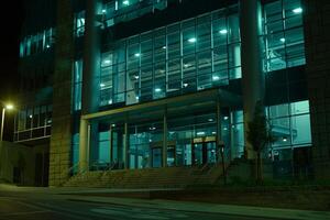 Modern office building windows lit in evening night early morning long working hours exhaustion overtime exterior urban architecture skyscraper lights tower financial sector banking hq photo