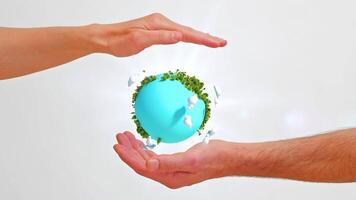 Hands hold and care for a planet Earth that spins and shines video