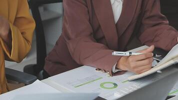 Team of business people working together in the meeting room office, teamwork background charts and graphs banner, double exposure successful teamwork,business planning concept. video
