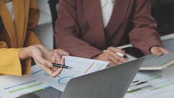 Team of business people working together in the meeting room office, teamwork background charts and graphs banner, double exposure successful teamwork,business planning concept. video