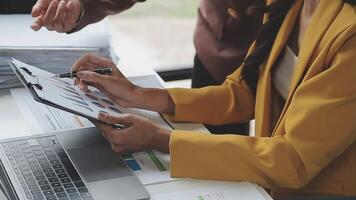 Team of business people working together in the meeting room office, teamwork background charts and graphs banner, double exposure successful teamwork,business planning concept. video