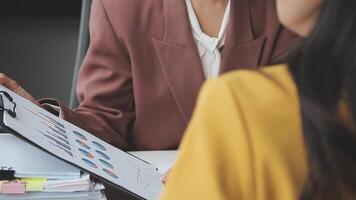 Team of business people working together in the meeting room office, teamwork background charts and graphs banner, double exposure successful teamwork,business planning concept. video