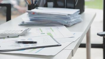 Team of business people working together in the meeting room office, teamwork background charts and graphs banner, double exposure successful teamwork,business planning concept. video