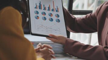 Team of business people working together in the meeting room office, teamwork background charts and graphs banner, double exposure successful teamwork,business planning concept. video