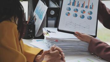 Team of business people working together in the meeting room office, teamwork background charts and graphs banner, double exposure successful teamwork,business planning concept. video