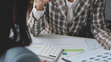 Team of business people working together in the meeting room office, teamwork background charts and graphs banner, double exposure successful teamwork,business planning concept. video