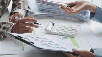 Team of business people working together in the meeting room office, teamwork background charts and graphs banner, double exposure successful teamwork,business planning concept. video