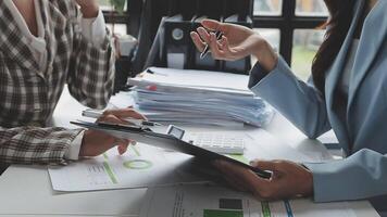 Team of business people working together in the meeting room office, teamwork background charts and graphs banner, double exposure successful teamwork,business planning concept. video