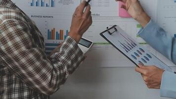 Team of business people working together in the meeting room office, teamwork background charts and graphs banner, double exposure successful teamwork,business planning concept. video