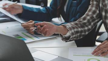 Team of business people working together in the meeting room office, teamwork background charts and graphs banner, double exposure successful teamwork,business planning concept. video
