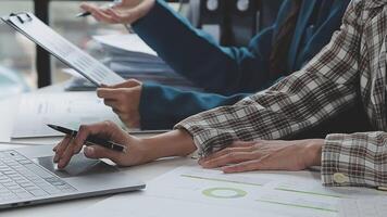 Team of business people working together in the meeting room office, teamwork background charts and graphs banner, double exposure successful teamwork,business planning concept. video