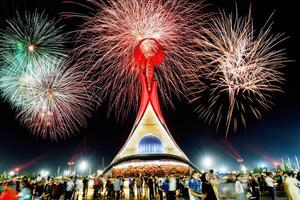 Tashkent, Uzbekistan - May 9, 2023 Memorial of Freedom and Independence in the form of a pyramid with a structure of national color on the square of the city park New Uzbekistan Yangi Uzbekistan photo