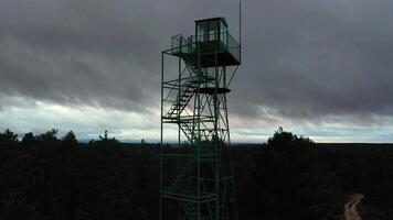 Aerial view of a watchtower between mountains. video