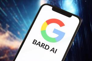 KYIV, UKRAINE - MARCH 17, 2024 Google Bard logo on iPhone display screen with background of artificial intelligence futuristic image photo