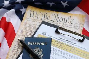 Department of State form DS11 Application for a U.S. Passport lies on table and ready to fill photo