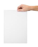 Hand with blank sheet of paper isolated on white with clipping path photo