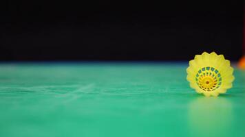 Close up view of uping shuttlecock during playing in badminton on inside court. High quality 4k footage video