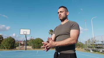 Man Warms Up Before Training In The Basketball Court video