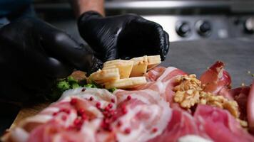 Chef Preparing Fresh Calabrian Cheese Into A Charcuterie Appetizer video