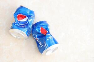 KYIV, UKRAINE - 4 MAY, 2023 Pepsi Classic in small can produced by PepsiCo Inc photo