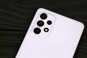 KYIV, UKRAINE - 4 MAY, 2023 Samsung Galaxy A72 Android smartphone with big display panel photo