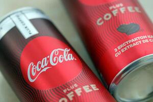 KYIV, UKRAINE - OCTOBER 31, 2023 Can of Coca Cola with coffee flavor. Closed tin can of drink with special design photo