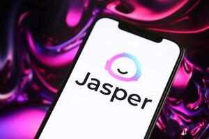 KYIV, UKRAINE - MARCH 17, 2024 Jasper logo on iPhone display screen with background of artificial intelligence futuristic image photo