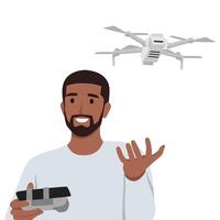 Young man with drone quadrocopter, Remote aerial drone with a camera. vector