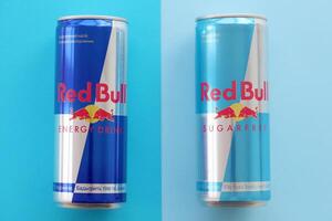 TERNOPIL, UKRAINE - JULY 7, 2023 Red Bull energy drink aluminium tin can with original design photo