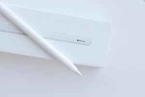 KYIV, UKRAINE - 4 MAY, 2023 New Apple pencil generation 2. Features a flat edge that attaches magnetically for automatic charging and pairing photo