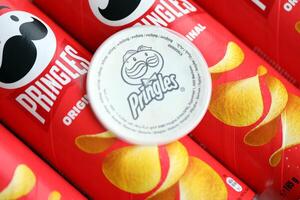 KYIV, UKRAINE - FEBRUARY 27, 2024 Pringles original potato chips on white background photo