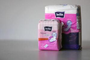 KYIV, UKRAINE - 4 MAY, 2023 Bella menstrual pads pack. Brand packet of period pads photo