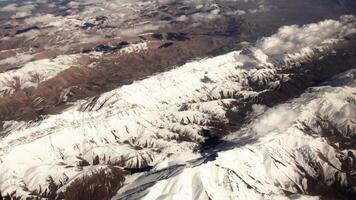 Aerial Airplane View of Snow Covered Mountain Range in Iran video
