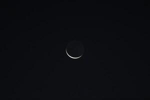 The crescent moon on its first day photo
