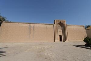Entry gate to the Abbasid Palace in Baghdad with blue sky photo