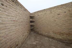 old shelves 2025 bc . shelves below the shelves without restoration , built of bricks in the house of the prophet of god , abraham, may god bless him and grant him peace in ur in Iraq . photo