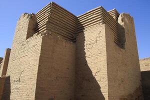 Ishtar gate in Babylon with blue sky photo