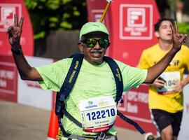 New Delhi, India - May 5 2024 - Vedanta Delhi Half Marathon race after covid in which marathon participants about to cross the finish line, Delhi Half Marathon 2023 photo