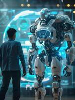 A man stands in front of a robot that is displayed on a screen photo
