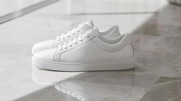 Fashionable blank sneakers mockup on a minimalist floor photo