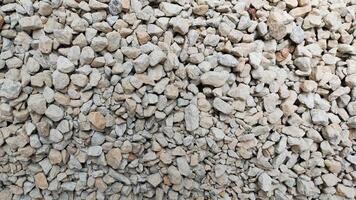 Close Up of Light Gray Gravel Texture with Various Rock Sizes for Construction and Landscaping Projects photo